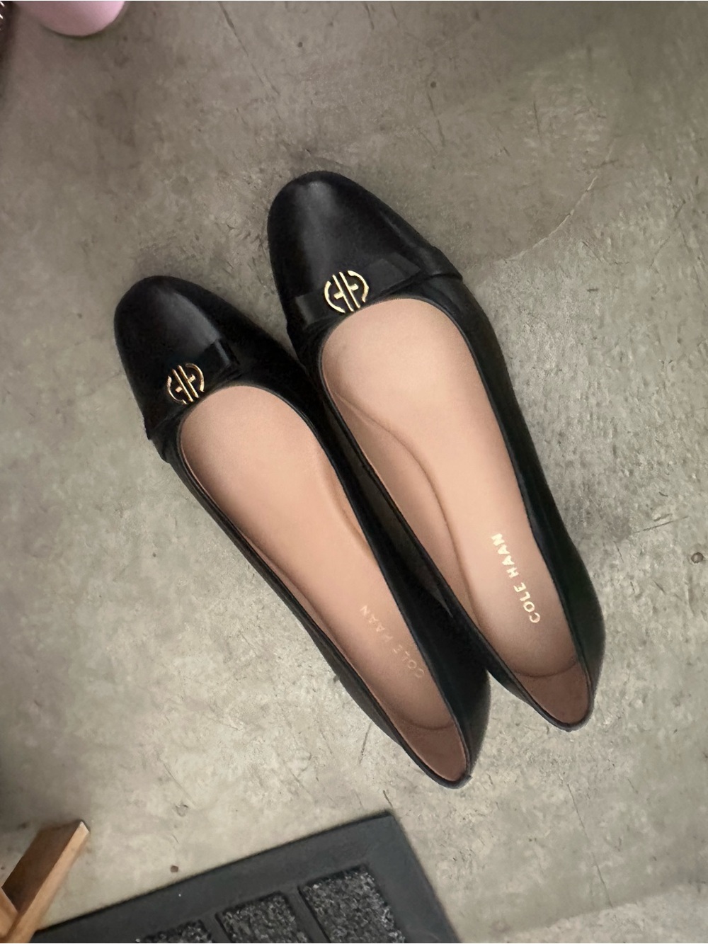 Cole Haan Black Leather Slip-On Ballet Flats with Gold Logo